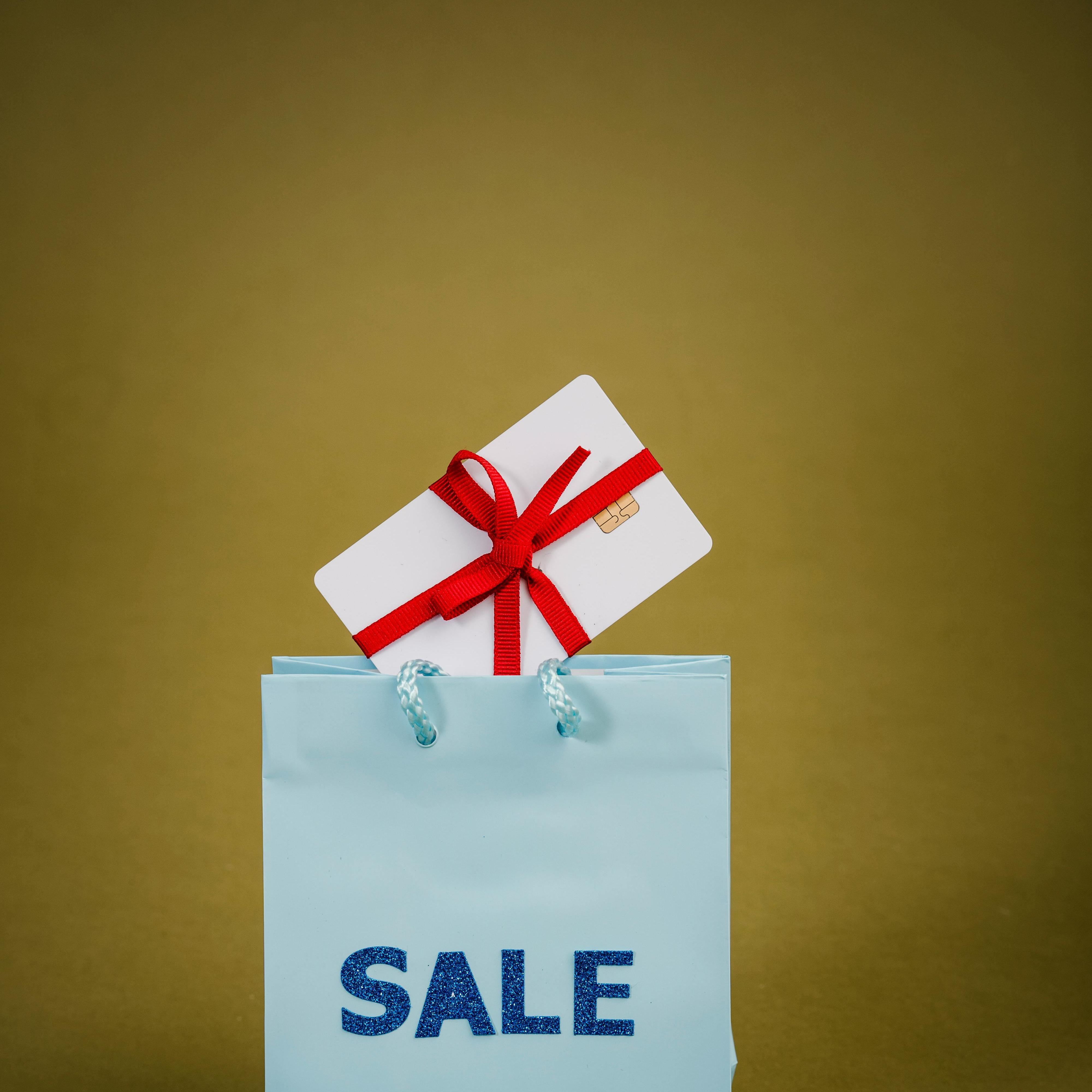 Verkaufstext Auf Blauer Papiertüte Mit Geschenkbox